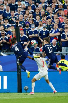 June 19, 2026; Foxborough, Massachusetts, USA; Scotland midfielder Scott McTominay (4) and Scotland forward Ben Gannon-Doak (17) try to get over the top of Morocco defender Noussair Mazraoui (3) during a FIFA World Cup, WM, Weltmeisterschaft, Fussball 2026 Group C match between Scotland and Morocco at Boston Stadium. (c) CSM - ZUMAc04_ 20260619_zma_c04_074 Copyright: xBurtxGranofskyx