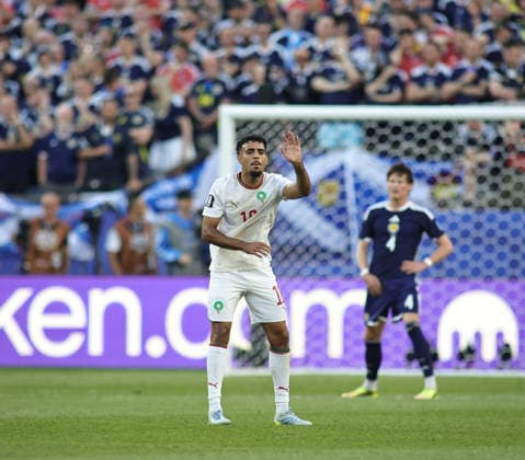 June 19, 2026, Foxborough, Massachusetts, USA: Morocco defender Chadi Riad (18) reacts to a play during the June 19th FIFA World Cup, WM, Weltmeisterschaft, Fussball 2026 matchup between Scotland and Morocco at Gillette Stadium in Foxborough, Massachusetts. Foxborough USA - ZUMAs325 20260619_zsp_s325_129 Copyright: xJessxStilesx