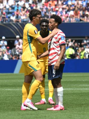 June 19, 2026, Seattle, Washington, United States: Tyler Adams (R) of United States men football team, Alessandro Circati (L) and Mohamed TourÃ (C) of Australia men football team seen in action during the FIFA World Cup, WM, Weltmeisterschaft, Fussball 2026 first stage Group D match between USA and Australia held at the Seattle Stadium. Final score; USA 2:0 Australia. FIFA World Cup 2026 United States Vs Australia Held At The Seattle Stadium In Seattle, USA -19 Jun 2026  - ZUMAs197 20260619_aaa_s197_217 Copyright: xLuisxVeniegrax