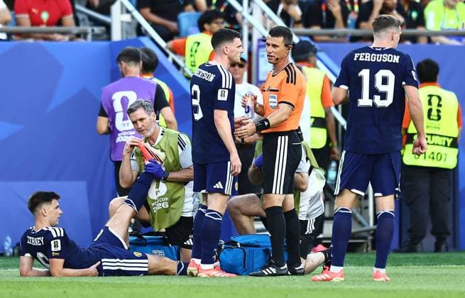 Kieran Tierney of Scotland receives treatments Scotland v Morocco, 2026 FIFA World Cup, WM, Weltmeisterschaft, Fussball Group C, Football, Boston Stadium, Foxborough, Massachusetts, USA - 19 Jun 2026Foxborough Boston Stadium Massachusetts (MA) United States of America EDITORIAL USE ONLY No use with unauthorised audio, video, data, fixture lists, club league logos or live services. Online in-match use limited to 120 images, no video emulation. No use in betting, games or single club league player publications.  Copyright: xMichaelxZemanek Shutterstockx 16928953fp