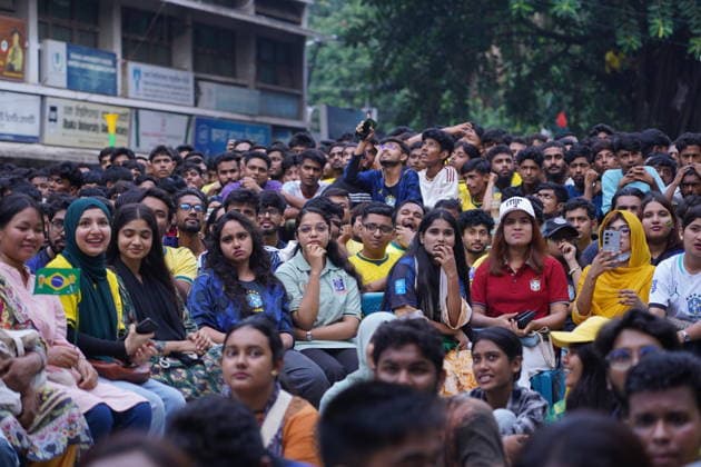 June 20, 2026, Dhaka, Dhaka, Bangladesh: Dhaka, Bangladesh, June 20, 2026: Football fans gather at the Teacher-Student Centre (TSC) of the University of Dhaka to watch the FIFA World Cup, WM, Weltmeisterschaft, Fussball match between Brazil and Haiti on a giant screen in Dhaka, Bangladesh. Thousands of supporters wearing Brazil s yellow and green colors cheered, waved flags, and celebrated throughout the match, creating a festive atmosphere at the venue. Following the game, jubilant fans took part in celebrations and victory processions, reflecting the enduring passion for football among Bangladeshi supporters. Dhaka Bangladesh - ZUMAk185 0859594112st Copyright: xRubelxKarmakerx