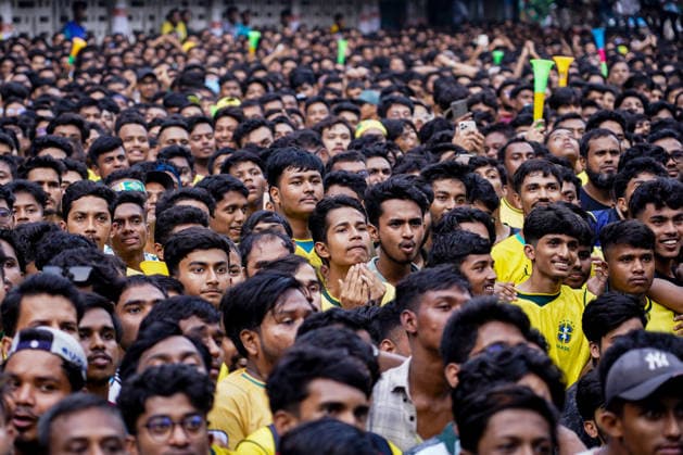 June 20, 2026, Dhaka, Dhaka, Bangladesh: Dhaka, Bangladesh, June 20, 2026: Football fans gather at the Teacher-Student Centre (TSC) of the University of Dhaka to watch the FIFA World Cup, WM, Weltmeisterschaft, Fussball match between Brazil and Haiti on a giant screen in Dhaka, Bangladesh. Thousands of supporters wearing Brazil s yellow and green colors cheered, waved flags, and celebrated throughout the match, creating a festive atmosphere at the venue. Following the game, jubilant fans took part in celebrations and victory processions, reflecting the enduring passion for football among Bangladeshi supporters. Dhaka Bangladesh - ZUMAk185 0859594132st Copyright: xRubelxKarmakerx