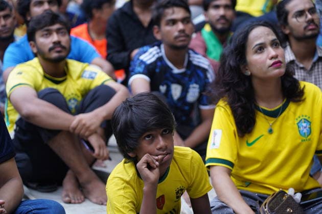 June 20, 2026, Dhaka, Dhaka, Bangladesh: Dhaka, Bangladesh, June 20, 2026: Football fans gather at the Teacher-Student Centre (TSC) of the University of Dhaka to watch the FIFA World Cup, WM, Weltmeisterschaft, Fussball match between Brazil and Haiti on a giant screen in Dhaka, Bangladesh. Thousands of supporters wearing Brazil s yellow and green colors cheered, waved flags, and celebrated throughout the match, creating a festive atmosphere at the venue. Following the game, jubilant fans took part in celebrations and victory processions, reflecting the enduring passion for football among Bangladeshi supporters. Dhaka Bangladesh - ZUMAk185 0859594170st Copyright: xRubelxKarmakerx