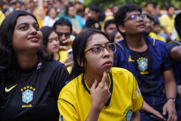 June 20, 2026, Dhaka, Dhaka, Bangladesh: Dhaka, Bangladesh, June 20, 2026: Football fans gather at the Teacher-Student Centre (TSC) of the University of Dhaka to watch the FIFA World Cup, WM, Weltmeisterschaft, Fussball match between Brazil and Haiti on a giant screen in Dhaka, Bangladesh. Thousands of supporters wearing Brazil s yellow and green colors cheered, waved flags, and celebrated throughout the match, creating a festive atmosphere at the venue. Following the game, jubilant fans took part in celebrations and victory processions, reflecting the enduring passion for football among Bangladeshi supporters. Dhaka Bangladesh - ZUMAk185 0859594281st Copyright: xRubelxKarmakerx