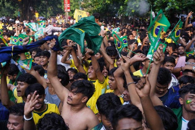 June 20, 2026, Dhaka, Dhaka, Bangladesh: Dhaka, Bangladesh, June 20, 2026: Football fans gather at the Teacher-Student Centre (TSC) of the University of Dhaka to watch the FIFA World Cup, WM, Weltmeisterschaft, Fussball match between Brazil and Haiti on a giant screen in Dhaka, Bangladesh. Thousands of supporters wearing Brazil s yellow and green colors cheered, waved flags, and celebrated throughout the match, creating a festive atmosphere at the venue. Following the game, jubilant fans took part in celebrations and victory processions, reflecting the enduring passion for football among Bangladeshi supporters. Dhaka Bangladesh - ZUMAk185 0859594352st Copyright: xRubelxKarmakerx