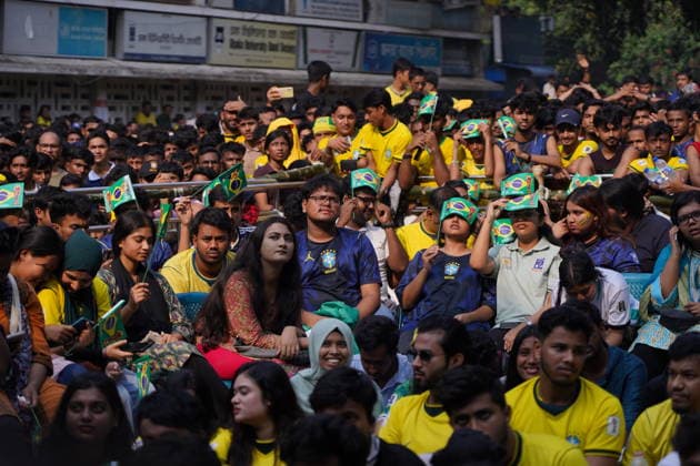 June 20, 2026, Dhaka, Dhaka, Bangladesh: Dhaka, Bangladesh, June 20, 2026: Football fans gather at the Teacher-Student Centre (TSC) of the University of Dhaka to watch the FIFA World Cup, WM, Weltmeisterschaft, Fussball match between Brazil and Haiti on a giant screen in Dhaka, Bangladesh. Thousands of supporters wearing Brazil s yellow and green colors cheered, waved flags, and celebrated throughout the match, creating a festive atmosphere at the venue. Following the game, jubilant fans took part in celebrations and victory processions, reflecting the enduring passion for football among Bangladeshi supporters. Dhaka Bangladesh - ZUMAk185 0859594384st Copyright: xRubelxKarmakerx