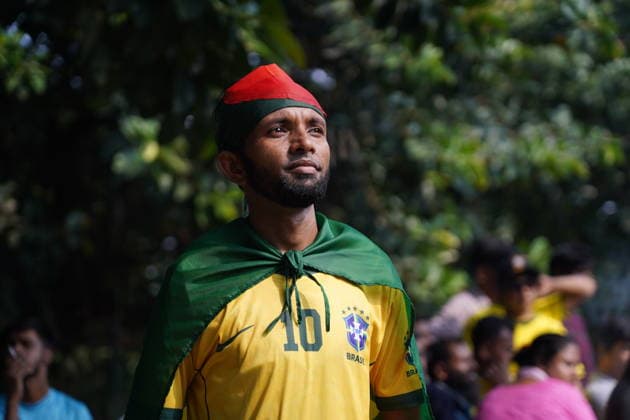 June 20, 2026, Dhaka, Dhaka, Bangladesh: Dhaka, Bangladesh, June 20, 2026: Football fans gather at the Teacher-Student Centre (TSC) of the University of Dhaka to watch the FIFA World Cup, WM, Weltmeisterschaft, Fussball match between Brazil and Haiti on a giant screen in Dhaka, Bangladesh. Thousands of supporters wearing Brazil s yellow and green colors cheered, waved flags, and celebrated throughout the match, creating a festive atmosphere at the venue. Following the game, jubilant fans took part in celebrations and victory processions, reflecting the enduring passion for football among Bangladeshi supporters. Dhaka Bangladesh - ZUMAk185 0859594385st Copyright: xRubelxKarmakerx