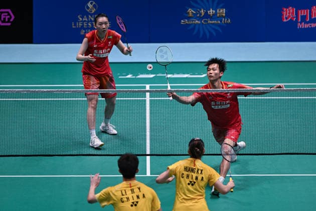 MACAO, CHINA - JUNE 19: Jiang Zhenbang and Wei Yaxin of China compete in the Mixed Doubles Quarterfinal match against Li Hongyi and Huang Kexin of China on day 4 of Macao Open Badminton 2026 at Macao East Asian Games Dome on June 19, 2026 in Macau, China.  Copyright: xVCGx 111649290084