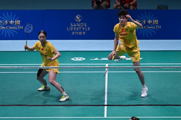 MACAO, CHINA - JUNE 19: Li Hongyi and Huang Kexin of China compete in the Mixed Doubles Quarterfinal match against Jiang Zhenbang and Wei Yaxin of China on day 4 of Macao Open Badminton 2026 at Macao East Asian Games Dome on June 19, 2026 in Macau, China.  Copyright: xVCGx 111649290089