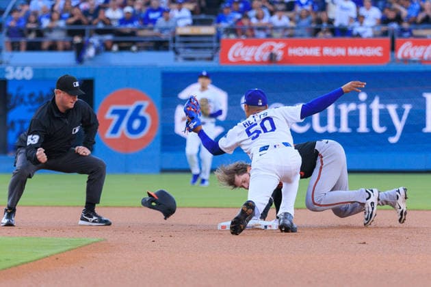 June 19, 2026, Los Angeles, California, USA: Mookie Betts 50 of the Los Angeles Dodgers catches the ball for an out on Taylor Ward 3 of the Baltimore Orioles on second base during a regular season MLB, Baseball Herren, USA game against the Baltimore Orioles on Friday June 19, 2026 at Dodger Stadium in Los Angeles, California. Dodgers defeat Orioles, 6-5. JAVIER ROJAS PI Dodgers Defeat Orioles, 6-5  - ZUMAp124 20260619_zaa_p124_007 Copyright: xJavierxRojasx
