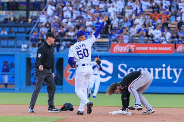 June 19, 2026, Los Angeles, California, USA: Mookie Betts 50 of the Los Angeles Dodgers catches the ball for an out on Taylor Ward 3 of the Baltimore Orioles on second base during a regular season MLB, Baseball Herren, USA game against the Baltimore Orioles on Friday June 19, 2026 at Dodger Stadium in Los Angeles, California. Dodgers defeat Orioles, 6-5. JAVIER ROJAS PI Dodgers Defeat Orioles, 6-5  - ZUMAp124 20260619_zaa_p124_009 Copyright: xJavierxRojasx