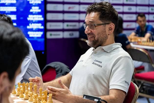 June 20, 2026, Hong Kong, Hong Kong, China: Chess Grandmaster LEVON ARONIAN (USA) jokes with his teammates and the opposing team about hockey before a Blitz match at the 2026 FIDE World Team Rapid and Blitz Chess Championship in Hong Kong.Chess Hong Kong China - ZUMAm298 0859595582st Copyright: xJamesxModestox