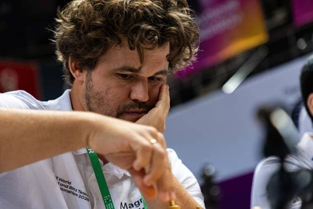 June 20, 2026, Hong Kong, Hong Kong, China: Chess Grandmaster MAGNUS CARLSEN (NOR) in focus during a Blitz match at the 2026 FIDE World Team Rapid and Blitz Chess Championship in Hong Kong.Chess Hong Kong China - ZUMAm298 0859596410st Copyright: xJamesxModestox