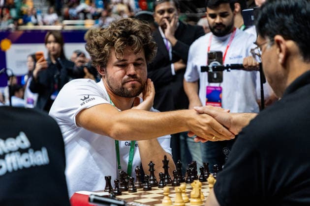 June 20, 2026, Hong Kong, Hong Kong, China: Chess Grandmasters MAGNUS CARLSEN (NOR) and VISWANATHAN ANAND (IND) duel in a Blitz match at the 2026 FIDE World Team Rapid and Blitz Chess Championship in Hong Kong. Hong Kong China - ZUMAm298 0859596944st Copyright: xJamesxModestox