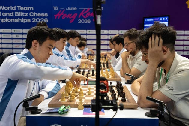 June 20, 2026, Hong Kong, Hong Kong, China: Chess Grandmasters NODIRBEK ABDUSATTOROV (UZB) and ALIREZA FIROUJZA (FRA) before a Blitz match at the 2026 FIDE World Team Rapid and Blitz Chess Championship in Hong Kong. Hong Kong China - ZUMAm298 0859596995st Copyright: xJamesxModestox