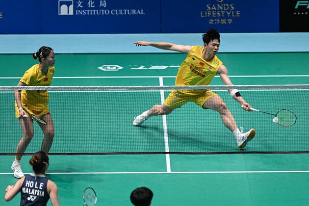 MACAO, CHINA - JUNE 18: Zhu Yijun and Li Qian of China compete in the Mixed Doubles Round of 16 match against Liew Xun and Ho Lo Ee of Malaysia on day 3 of Macao Open Badminton 2026 at Macao East Asian Games Dome on June 18, 2026 in Macao, China.  Copyright: xVCGx 111648947136
