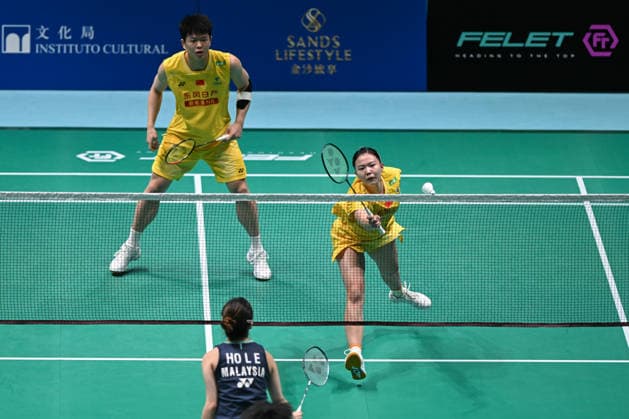 MACAO, CHINA - JUNE 18: Zhu Yijun and Li Qian of China compete in the Mixed Doubles Round of 16 match against Liew Xun and Ho Lo Ee of Malaysia on day 3 of Macao Open Badminton 2026 at Macao East Asian Games Dome on June 18, 2026 in Macao, China.  Copyright: xVCGx 111648947131