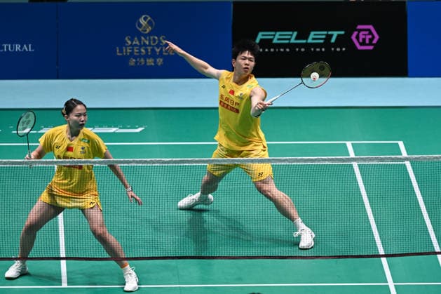 MACAO, CHINA - JUNE 18: Zhu Yijun and Li Qian of China compete in the Mixed Doubles Round of 16 match against Liew Xun and Ho Lo Ee of Malaysia on day 3 of Macao Open Badminton 2026 at Macao East Asian Games Dome on June 18, 2026 in Macao, China.  Copyright: xVCGx 111648947126