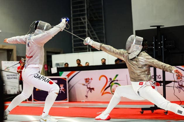 June 19, 2026, New Delhi, Delhi, India: Tsumori Shido (Japan) vs. Chan Lok Hei Royce (Hong Kong) during Asian Senior Fencing Championships 2026 (Men s Sabre) at Bharat Mandapam Convention Centre, New Delhi, India on 19th June 2026. New Delhi India - ZUMAd207 20260619_zsp_d207_340 Copyright: xAvijitxDasx