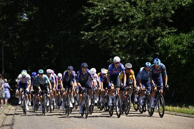 Baloise Belgium Tour 2026 Stage 4 AARSCHOT, BELGIUM - JUNE 20 : Riders of Pinarello Q36.5 Pro Cycling Team, Team Alpecin - Premier Tech, Team Soudal Quick-Step in the peloton during stage 4 of the 95th edition of Baloise Tour of Belgium an UCI ProSeries 2.Pro cycling road race stage for Men Elite of 183.5 km with start in Begijnendijk and finish in Aarschot on June 20, 2026 in Aarschot, Belgium, 20 06 2026 ( Motordriver Stephan Boone - Aarschot Belgium  Copyright: xTomasxSiskx