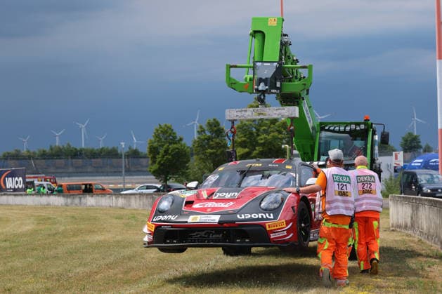 Bastian Buus (DK Land-Motorsport, 29), Porsche 911 GT3 R Evo, lands in the gravel bed, is dragged off the track, DTM (German Touring Car Championship) - Round 3 - Race 1, DEKRA Lausitzring on 20.06.2026. Brandenburg Deutschland Copyright: xO.Frankex