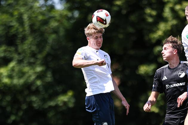 June 20, 2026, xkwix, soccer, exhibition match, SC Spelle Venhaus vs. FC Gütersloh, Arena am Stuckenberg, 2026–2027 season, Niklas Möllers, FC Gütersloh 2, heading the ball. DFB regulations prohibit any use of photographs as image sequences and or quasi-video. Photo