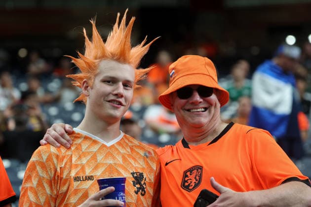 HOUSTON, TX - JUNE 20: Father and son Netherlands fans in the stands ahead of the FIFA World Cup, WM, Weltmeisterschaft, Fussball 2026 Group F match between Netherlands and Sweden on June 20, 2026, at Houston Stadium in Houston, Texas. (Photo by David Buono Icon Sportswire) SOCCER: JUN 20 FIFA World Cup 26 Group F - Netherlands vs Sweden EDITORIAL USE ONLY Icon260620007