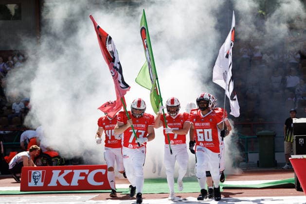Maximilian Ziegler 44, Augsburg Centurions, Thomas Heller 73, Augsburg Centurions, Anthony Aiello 7, Augsburg Centurions, and Darnell Mukendi, 60, Augsburg Centurions, during the game between the Augsburg Centurions and the Gießen Golden Dragons, American football, men’s, GFL2, 2026, Matchday 7 on June 20, 2026, in Augsburg, Rosenaustadion, Bavaria, Germany,detected_source_language