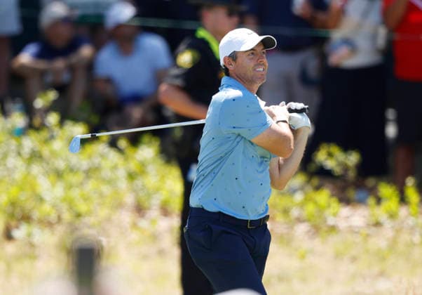 Rory McIlroy of Northern Ireland reacts after a tee shot on the second hole in the third round of the 126th U.S. Open Golf Championship at Shinnecock Hills Golf Club in Southampton, NY on Saturday, June 20, 2026.  NYC202606202007 JOHNxANGELILLO