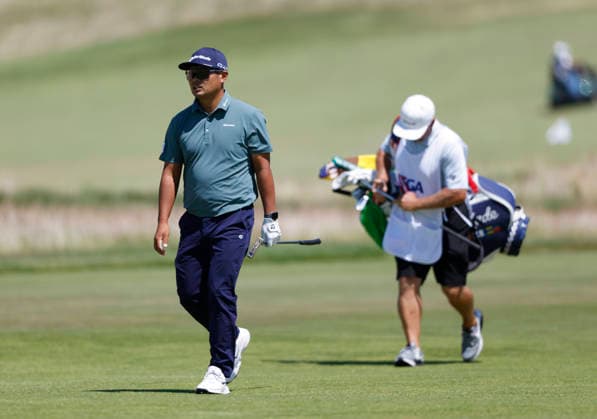 Ryo Hisatsune of Japan walks to the green after hitting an approach shot to the first hole in the third round of the 126th U.S. Open Golf Championship at Shinnecock Hills Golf Club in Southampton, NY on Saturday, June 20, 2026.  NYC202606202006 JOHNxANGELILLO
