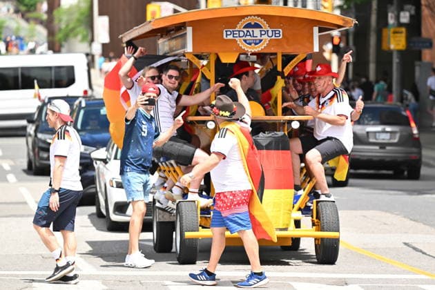 June 20, 2026, Toronto, On, Canada: Team Germany fans march toward Toronto Stadium before their team takes on Ivory Coast in World Cup soccer action in Toronto on Saturday, June 20, 2026. Canada News - June 20, 2026  - ZUMAc35_ 20260620_zaf_c35_014 Copyright: xJonxBlackerx