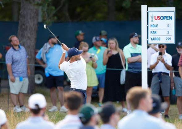 Wyndham Clark hits a tee shot on the second hole in the third round of the 126th U.S. Open Golf Championship at Shinnecock Hills Golf Club in Southampton, NY on Saturday, June 20, 2026.  NYC202606202012 JOHNxANGELILLO
