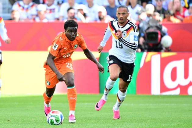 FIFA World Cup, WM, Weltmeisterschaft, Fussball 2026 - Group E - Germany vs Ivory Coast Christ Inao Oulai of Ivory Coast (L) and Leroy Sane of Germany (R) in action during the FIFA World Cup 2026 group stage match Germany against Ivory Coast, in Toronto, Canada, 20 June 2026. TORONTO United States  Copyright: xEDUARDOxLIMAx