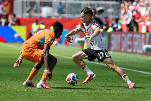 one-on-one, action, featuring Wilfried Singo (5, Ivory Coast) and Florian Wirtz (17, Germany), Germany vs. Ivory Coast, soccer, FIFA, 2026 World Cup, group stage, June 20, 2026, Toronto, Ontario, Canada,detected_source_language Copyright: xkolbert-press ChristianxKolbertx
