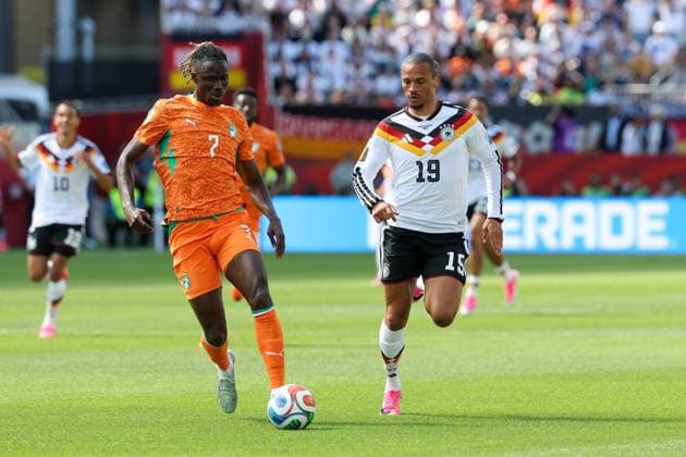 One-on-one, Action, featuring Odilon Kossounou (7, Ivory Coast) and Leroy Sané (19, Germany), Germany vs. Ivory Coast, Soccer, FIFA, 2026 World Cup, Group Stage, June 20, 2026, Toronto, Ontario, Canada,detected_source_language Copyright: xkolbert-press ChristianxKolbertx