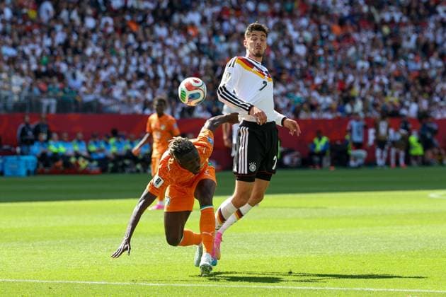 One-on-one, Action, featuring Odilon Kossounou 7 (Ivory Coast) and Kai Havertz 7 (Germany), Germany vs. Ivory Coast, Soccer, FIFA, 2026 World Cup, Group Stage, June 20, 2026, Toronto, Ontario, Canada,detected_source_language Copyright: xkolbert-press ChristianxKolbertx