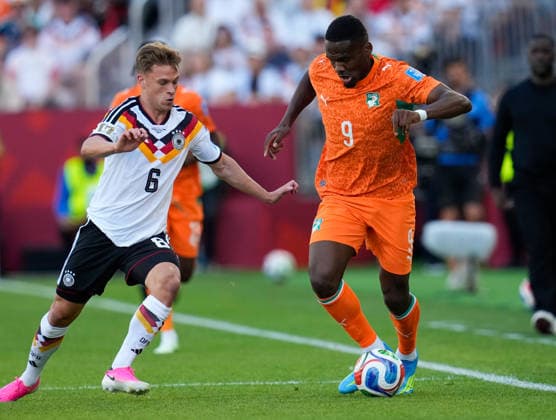 Joshua Kimmich (Germany), 6 vs. Ange Yoan Bonny (Ivory Coast), 9 CAN, FIFA World Cup, Germany vs. Ivory Coast, Toronto, June 20, 2026 CAN, FIFA World Cup, Germany vs. Ivory Coast, Toronto, June 20, 2026, Toronto,detected_source_language Copyright: xEibner-Pressefoto ScottxColemanx EP_SCN
