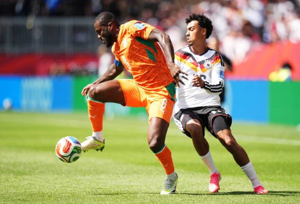 June 20, 2026, Toronto, On, CANADA: Ivory Coast s Franck Kessie (8) controls the ball in front of Germany s Nathaniel Brown (18) during the first half of a World Cup Group E soccer match, in Toronto, on Saturday, June 20, 2026. Canada News - June 20, 2026  - ZUMAc35_ 20260620_zaf_c35_059 Copyright: xNathanxDenettex