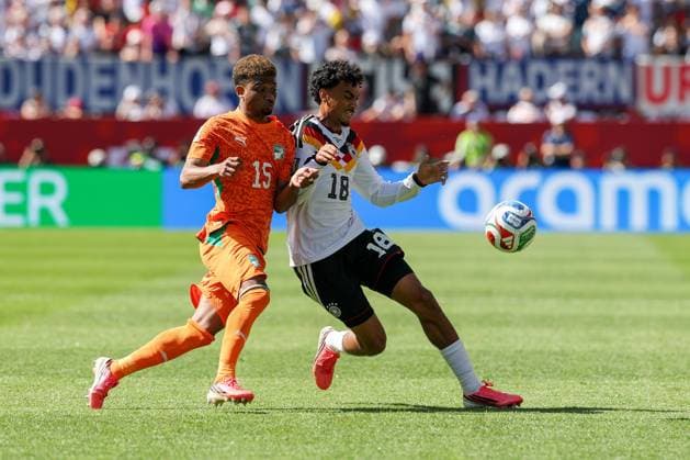 One-on-one, action, featuring Amad Diallo (15, Ivory Coast) and Nathaniel Brown (18, Germany), Germany vs. Ivory Coast, soccer, FIFA, 2026 World Cup, group stage, June 20, 2026, Toronto, Ontario, Canada,detected_source_language Copyright: xkolbert-press ChristianxKolbertx