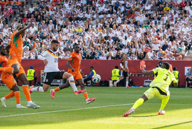 Soccer, Mens, 2026 FIFA World Cup, Group E match in Toronto, Matchday 2, Germany vs. Ivory Coast, Deniz Undav (Germany) scores the goal to tie the game at 1–1 against Franck Kessie (Ivory Coast), Odilon Kossounou (Ivory Coast), Wilfried Singo (Ivory Coast), and goalkeeper Yahia Fofana (Ivory Coast), June 20, 2026,,detected_source_language Copyright: xMatthiasxKochx