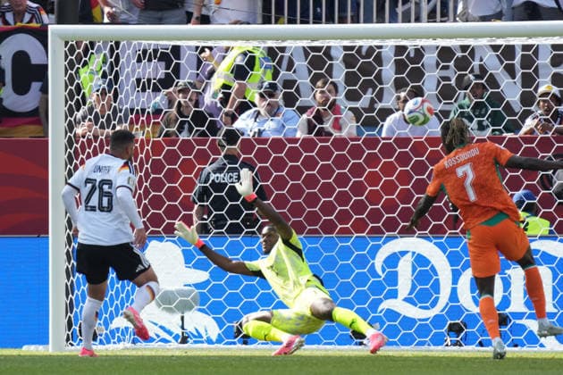 Deniz Undav of Germany scores the goal to tie the game at 1–1 against goalkeeper Yahia Fofana of Ivory Coast, Ivory Coast, Côte dIvoire, June 20, 2026, Germany vs. Ivory Coast, Toronto Stadium, World Cup 26, Group E, Matchday 2,detected_source_language