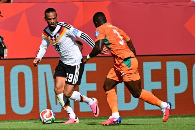 FIFA World Cup, WM, Weltmeisterschaft, Fussball 2026 - Group E - Germany vs Ivory Coast Leroy Sane of Germany (L) in action against Ghislain Konan of Ivory Coast (R) during the FIFA World Cup 2026 group stage match Germany against Ivory Coast, in Toronto, Canada, 20 June 2026. TORONTO United States  Copyright: xEDUARDOxLIMAx