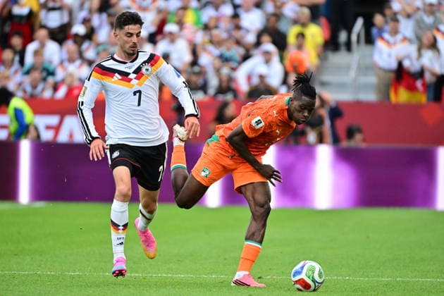 FIFA World Cup, WM, Weltmeisterschaft, Fussball 2026 - Group E - Germany vs Ivory Coast Kai Havertz of Germany (L) in action against Wilfried Singo of Ivory Coast (R) during the FIFA World Cup 2026 group stage match Germany against Ivory Coast, in Toronto, Canada, 20 June 2026. TORONTO United States  Copyright: xEDUARDOxLIMAx