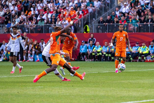Soccer, Mens, 2026 FIFA World Cup, Group E match in Toronto, Matchday 2, Germany vs. Ivory Coast, Deniz Undav of Germany scores the goal to make it 2–1 against Emmanuel Agbadou of Ivory Coast, June 20, 2026,,detected_source_language Copyright: xMatthiasxKochx