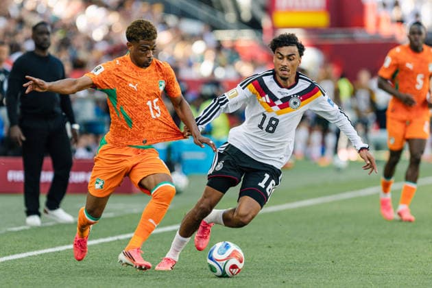 Amad Diallo of Ivory Coast contests with Nathaniel Brown of Germany during the FIFA World Cup, WM, Weltmeisterschaft, Fussball game between Germany and Ivory Coast at Toronto Stadium on June 20, 2026 in Toronto, Ontario, Canada  Copyright: xCurtisxWongx xSPPx Sportspressphoto_SPR171962