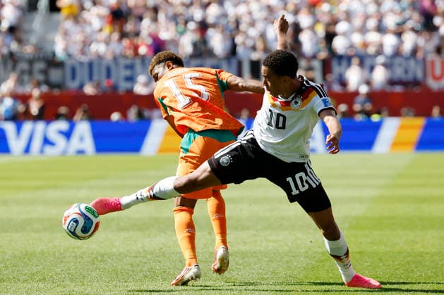 Jamal Musiala (R) of Germany battles for the ball with Amad Diallo (L) of Ivory Coast in a Group E match of the 2026 FIFA World Cup, WM, Weltmeisterschaft, Fussball between Germany and Ivory Coast at BMO Stadium in Toronto, Canada, 20 June 2026. FIFA World Cup 2026 - Group E - Germany vs. Ivory Coast !ACHTUNG: NUR REDAKTIONELLE NUTZUNG!  Copyright: xBienvenidoxVelascox GR6359 20260620-55020660558_1