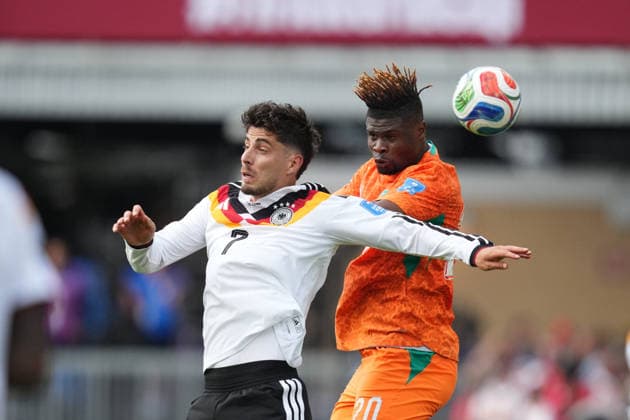 Kai Havertz of Germany and Emmanuel Agbadou of Ivory Coast battle for the ball during the Germany vs. Ivory Coast match in Group E of the 2026 FIFA World Cup at Toronto Stadium in Toronto, Canada, on June 20, 2026. Photo by DeFodi Images (Thor Wegner),detected_source_language