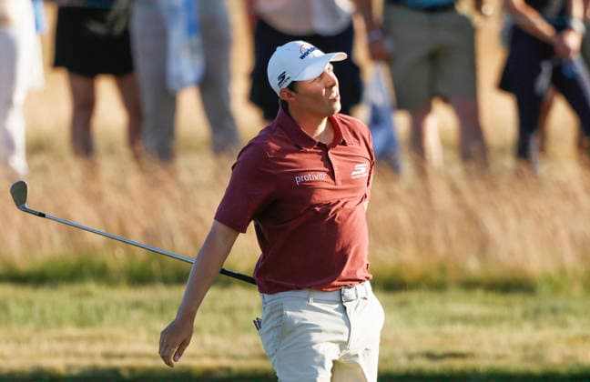 Matt Fitzpatrick of England watches his second shot on the 15th hole during the third round of the 126th U.S. Open Golf Championship at Shinnecock Hills Golf Club in Southampton, NY, on Saturday, June 20, 2026.  NYC20260620824 JOHNxANGELILLO