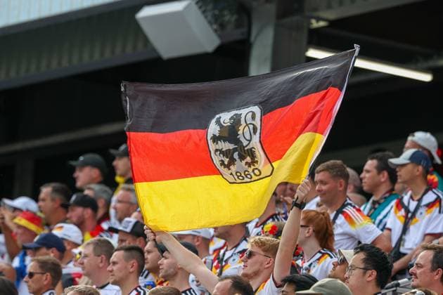 German fans with a flag and the TSV 1860 crest, Germany vs. Ivory Coast, soccer, FIFA, 2026 World Cup, group stage, June 20, 2026, Toronto, Ontario, Canada,detected_source_language Copyright: xkolbert-press ChristianxKolbertx
