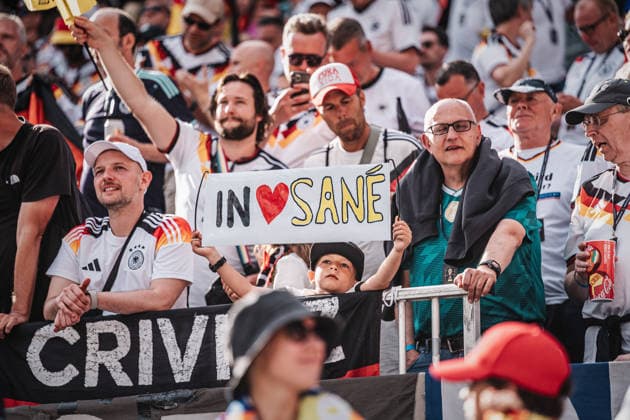 Mens Soccer 2026 FIFA World Cup Group E Germany vs. Ivory Coast June 20, 2026 A child holds a sign that reads Insane Heart Leroy Sane 19, Germany, Toronto, Toronto Stadium, Ontario, Canada,detected_source_language
